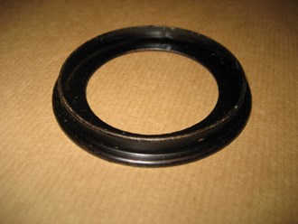 RETAINER, FRONT PACKING, TIMING COVER